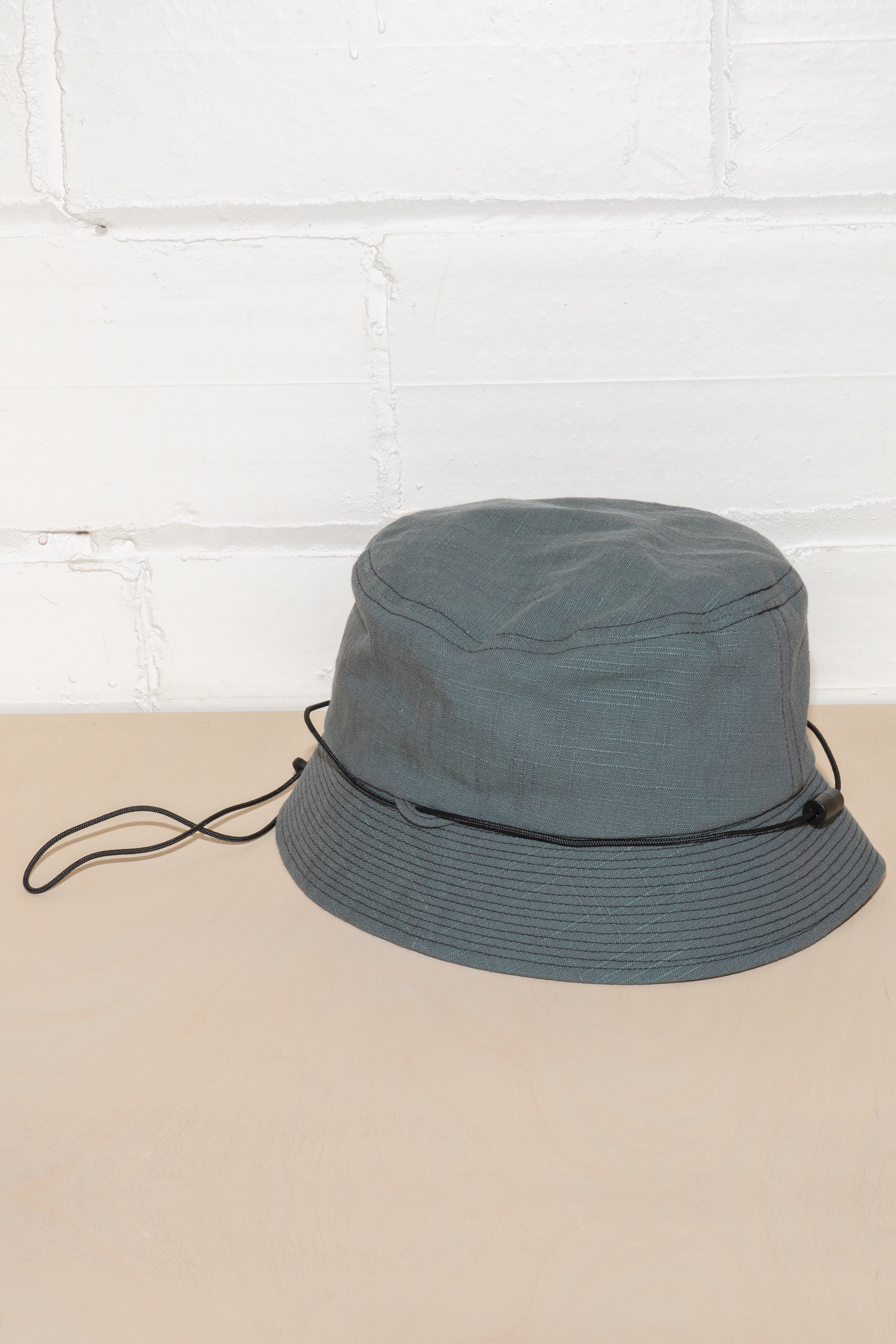 DEVELOPMENT BY NOROLL- BUCKET HAT IN DARKEST GREEN