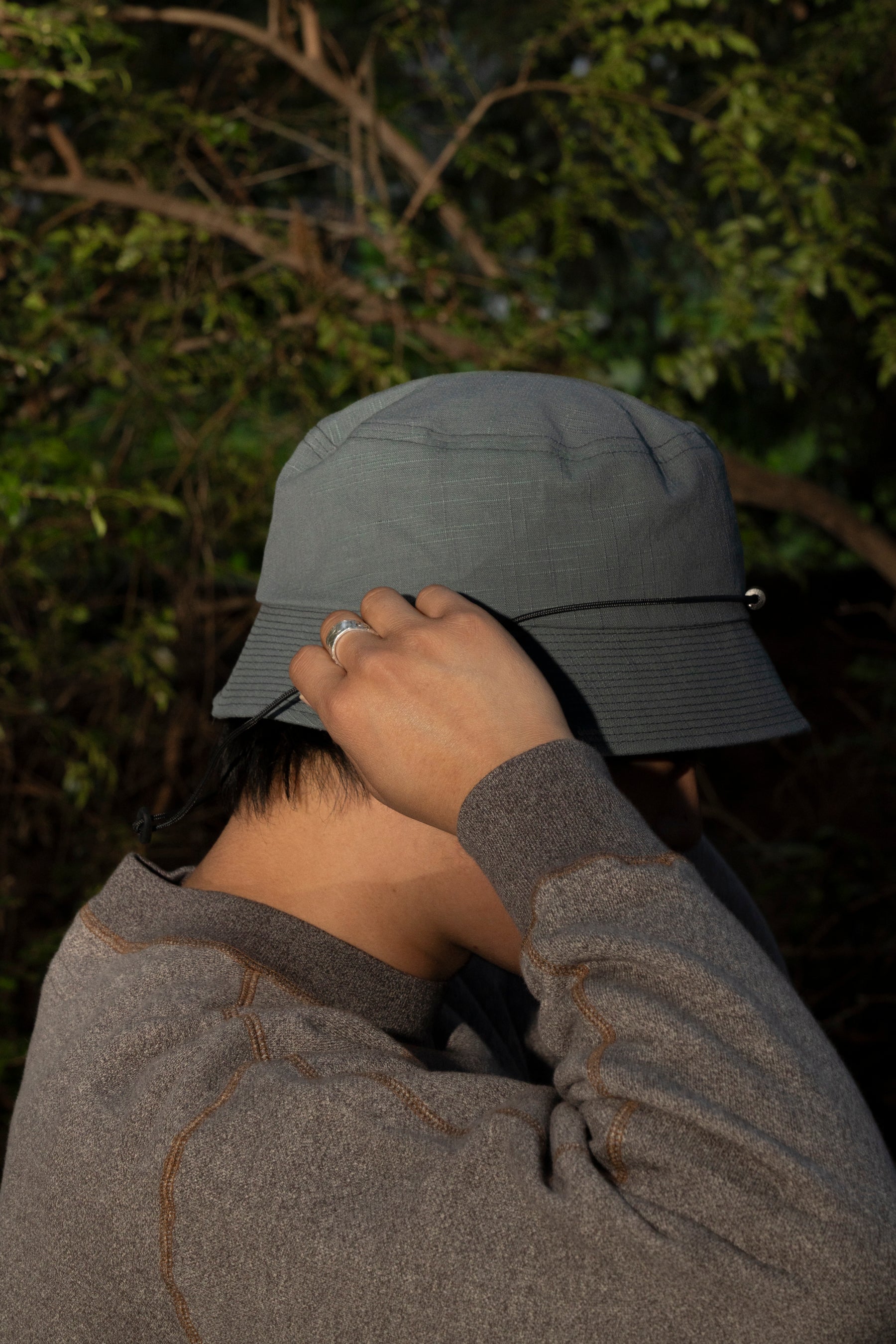 DEVELOPMENT BY NOROLL- BUCKET HAT IN DARKEST GREEN